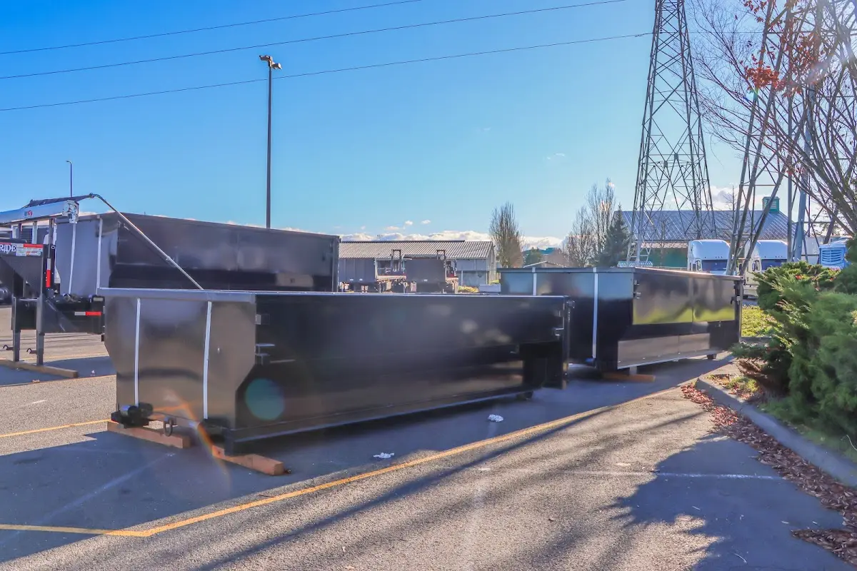 Roll-off dumpster ready for waste disposal at job site for Yard Waste Dumpster Rental in Stafford